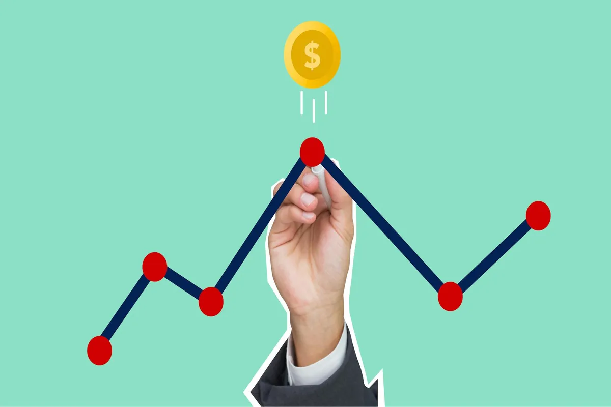 Dono de negócio analisando gráfico de crescimento financeiro após mapear concorrência